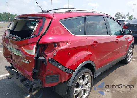 2014 Ford Escape Titanium z USA, uszkodzony, nr VIN 1FMCU0J96EUC43287